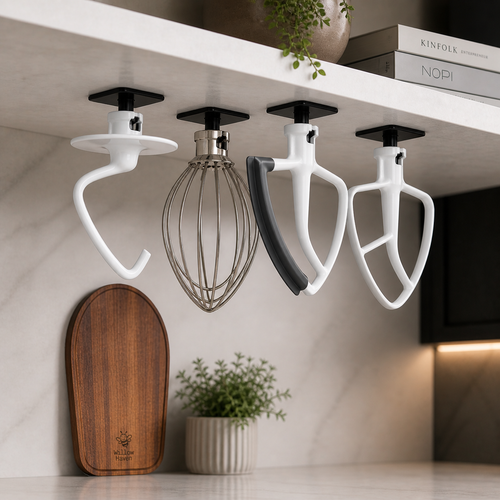 Beater and dough hook hanging on wall-mount holders
